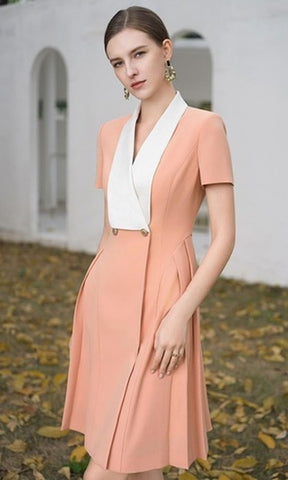 Elegant Peach Dress with Contrasting White Lapel